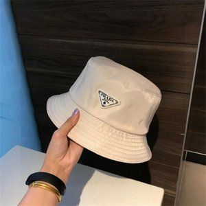 Prada Fisherman's hat with white triangle tag